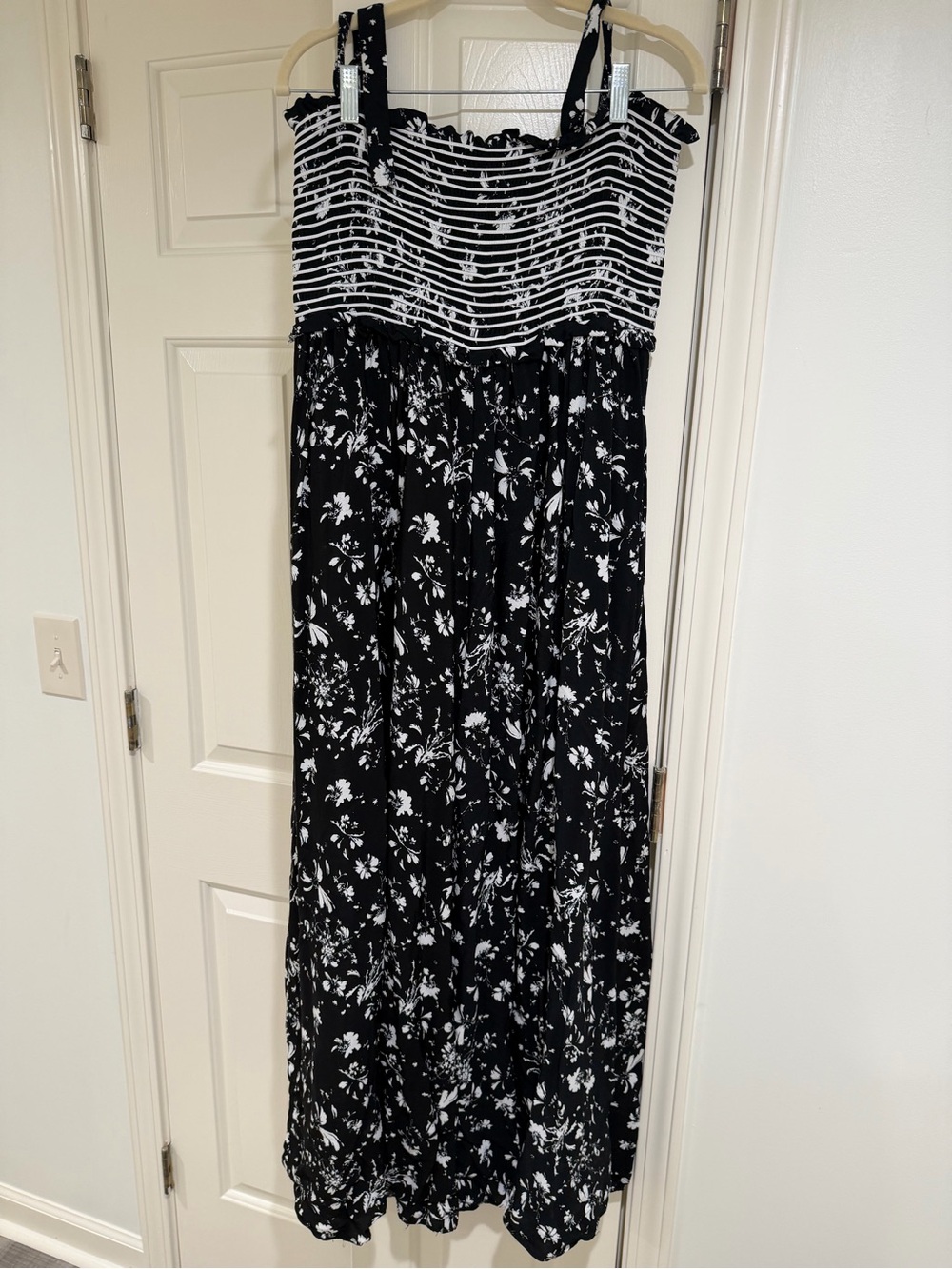 Free people Black & White Floral bellbottom romper with Striped Bodice